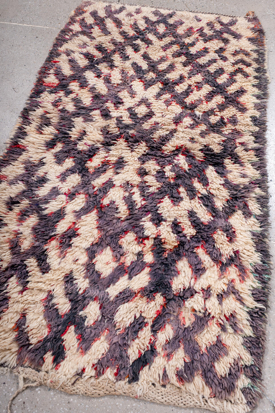 3' x 5' one-of-a-kind handmade vintage Moroccan small size rug. Color palette: ivory, plum, charcoal, crimson, rose, pink