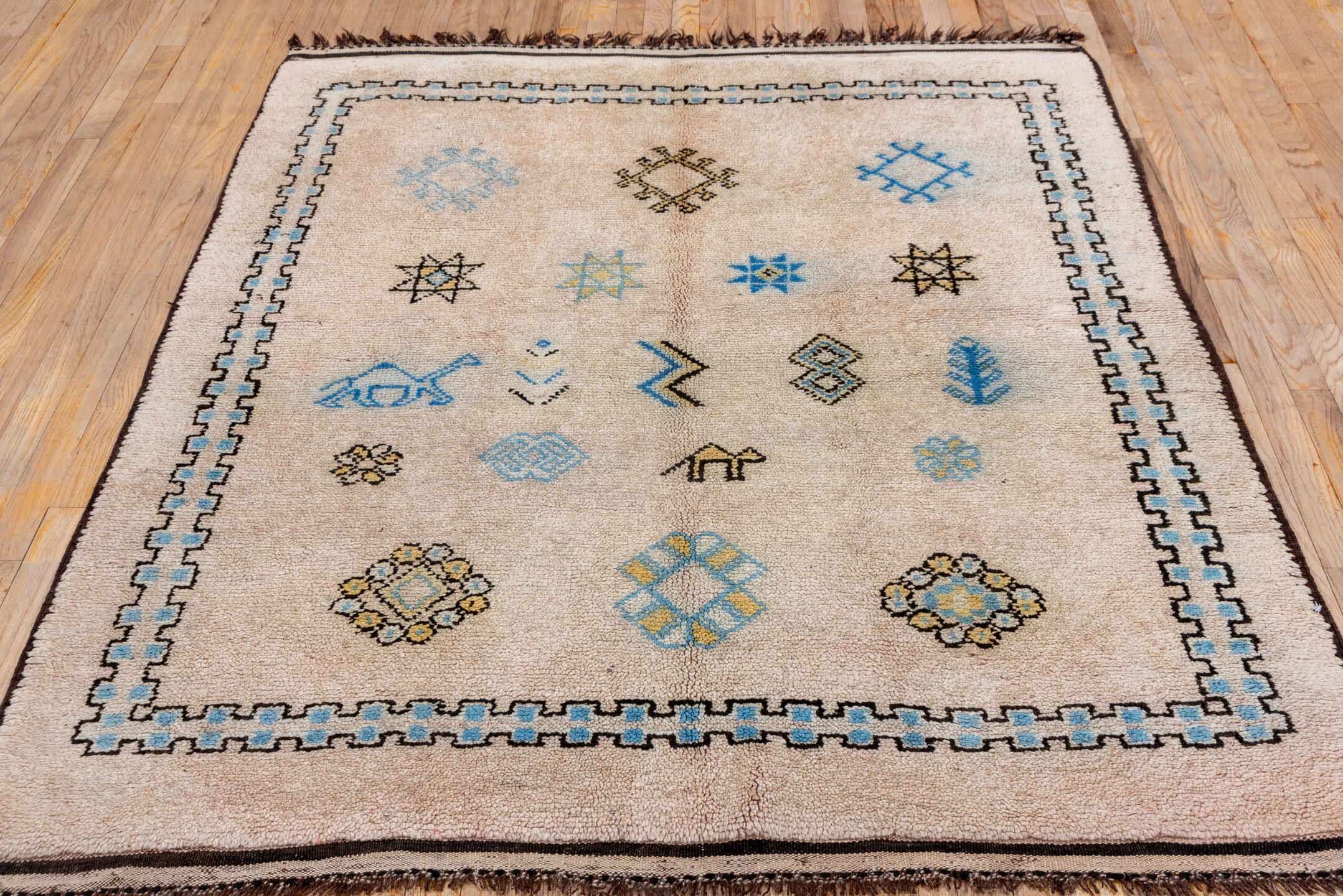 5' x 6' one-of-a-kind handmade vintage Moroccan rug. Color palette: blue, brown, dark gray, gray, light gray