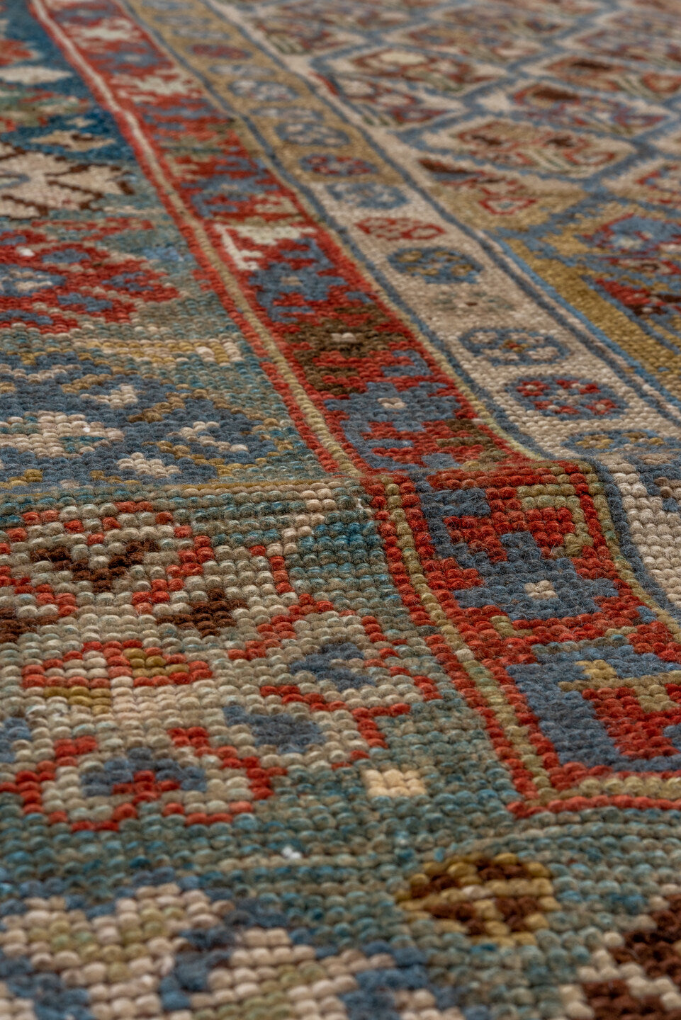 5' x 12' one-of-a-kind handmade antique NW Persian rug. Color palette: camel, ivory, slate, rust, blue, taupe, charcoal