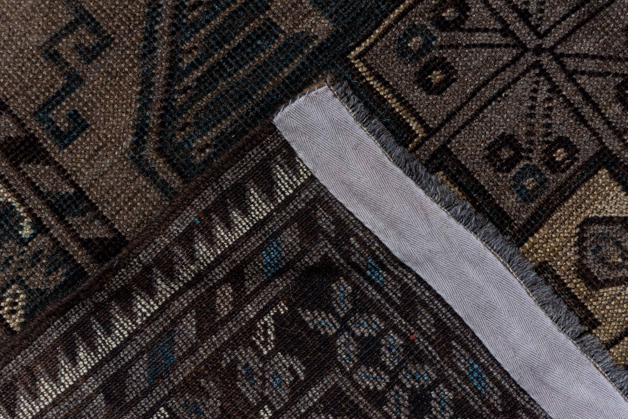 7' x 10' one-of-a-kind handmade vintage Afghan large size rug. Color palette: black, brown, gray, light gray, off-white
