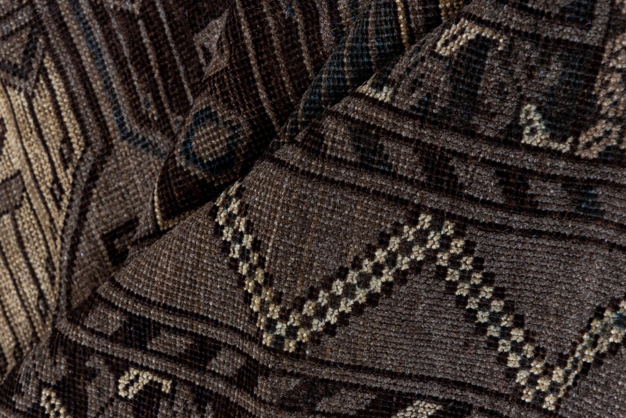 7' x 10' one-of-a-kind handmade antique Afghan large size rug. Color palette: brown, taupe, camel, ebony, ivory, beige, gray