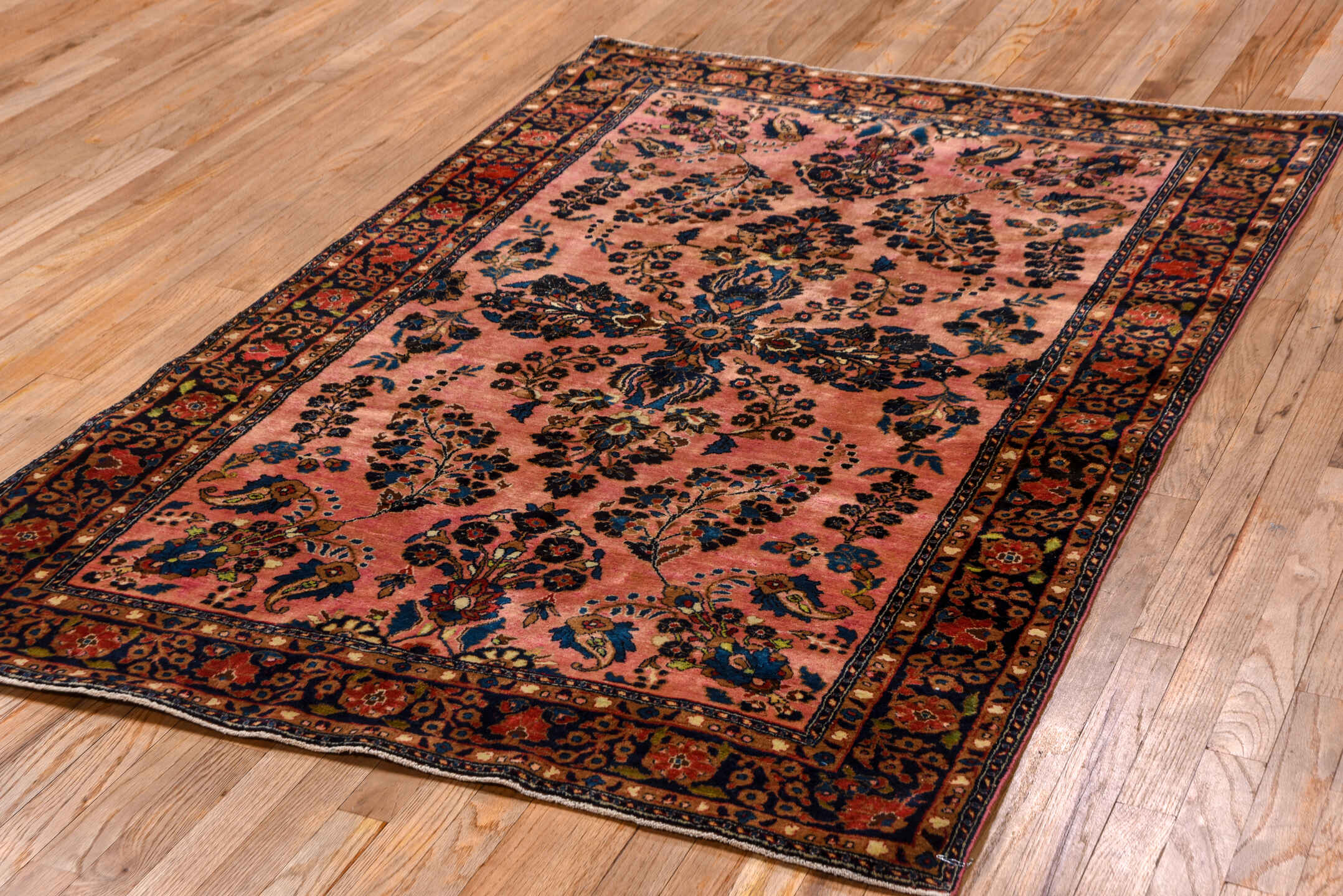 4' x 6' one-of-a-kind handmade antique Sarouk small size rug. Color palette: rose, navy, rust, ivory, coral, burgundy, gold