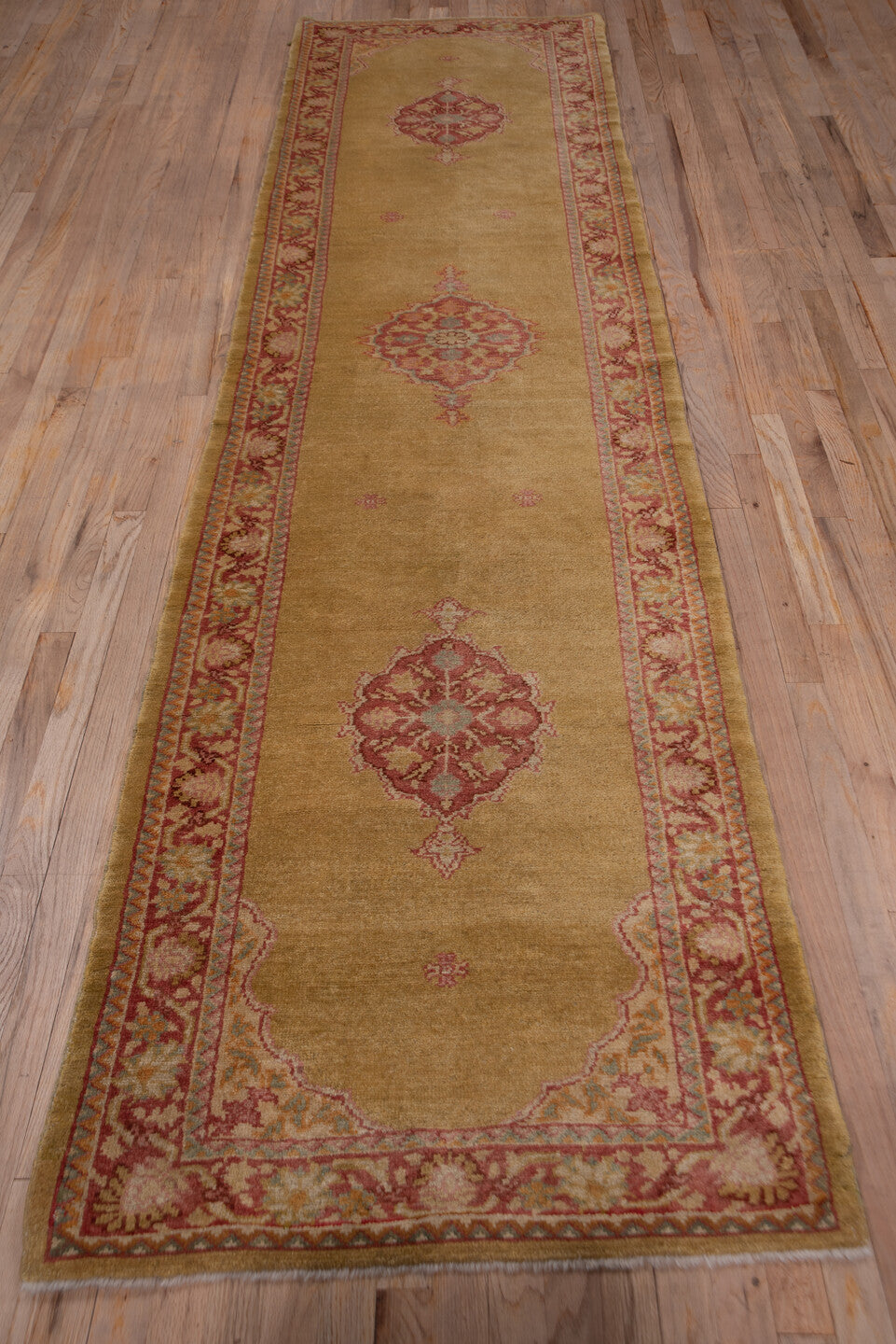 2' x 11' one-of-a-kind handmade vintage Oushak runner rug. Color palette: brown, off-white, pink, red, snow, white