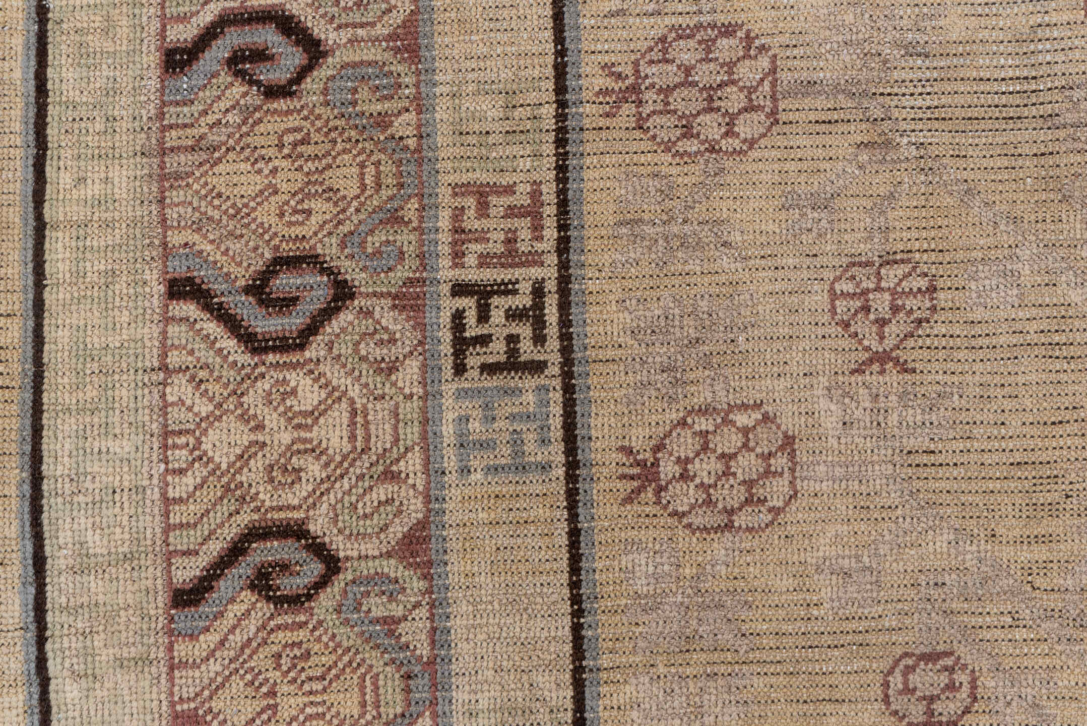 4' x 8' one-of-a-kind handmade vintage Khotan rug. Color palette: ivory, taupe, brown, camel, rose, slate, beige, gray, pink
