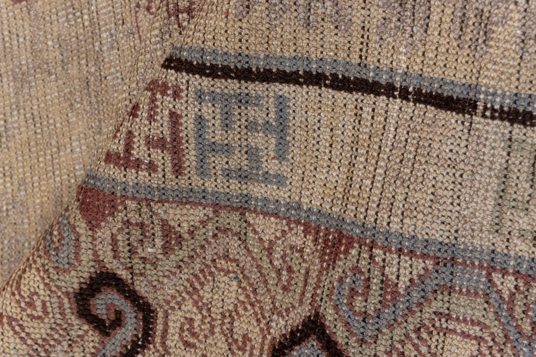 4' x 8' one-of-a-kind handmade vintage Khotan rug. Color palette: ivory, taupe, brown, camel, rose, slate, beige, gray, pink