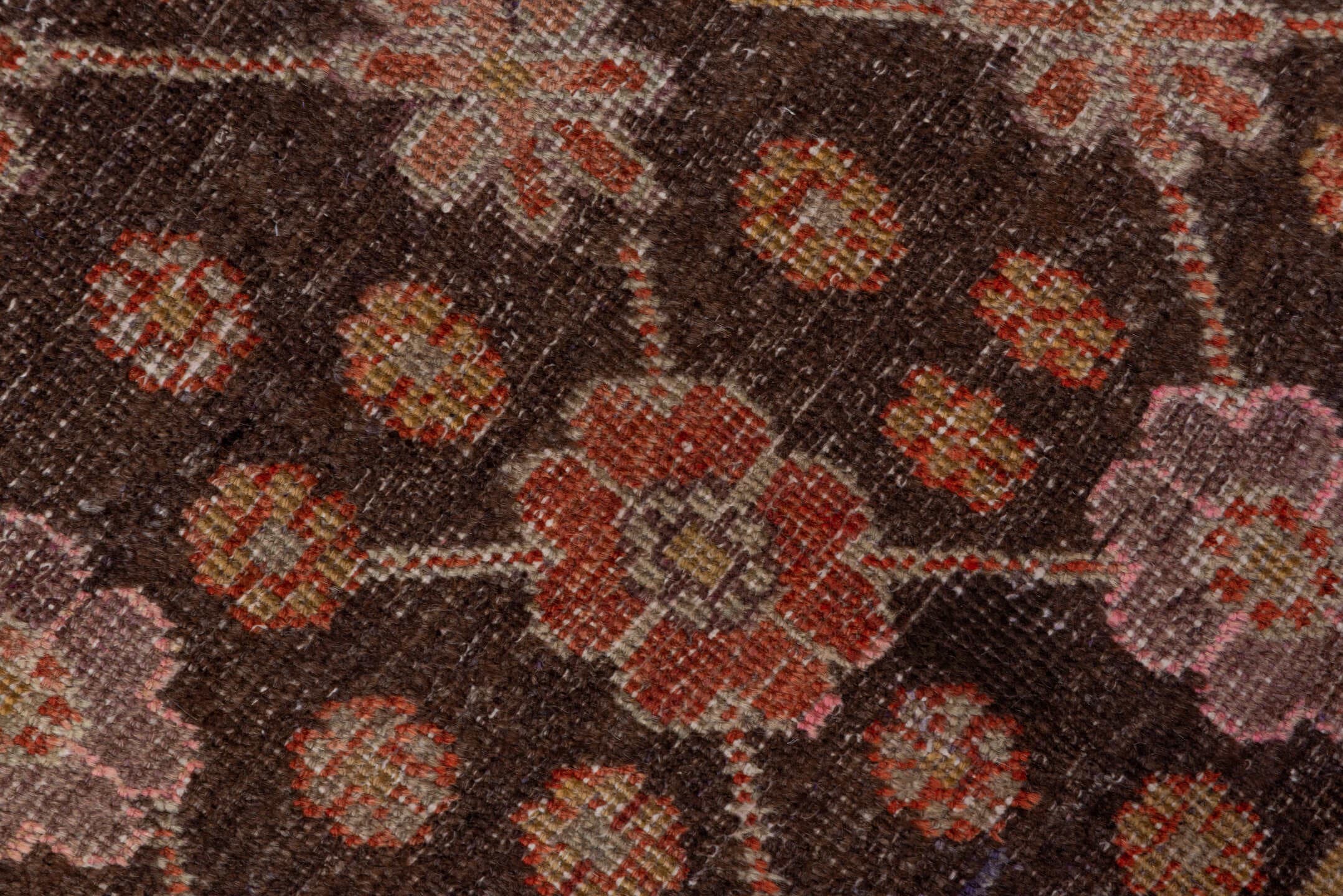 4' x 8' one-of-a-kind handmade vintage Khotan rug. Color palette: brown, rust, camel, ivory, rose, blue, charcoal