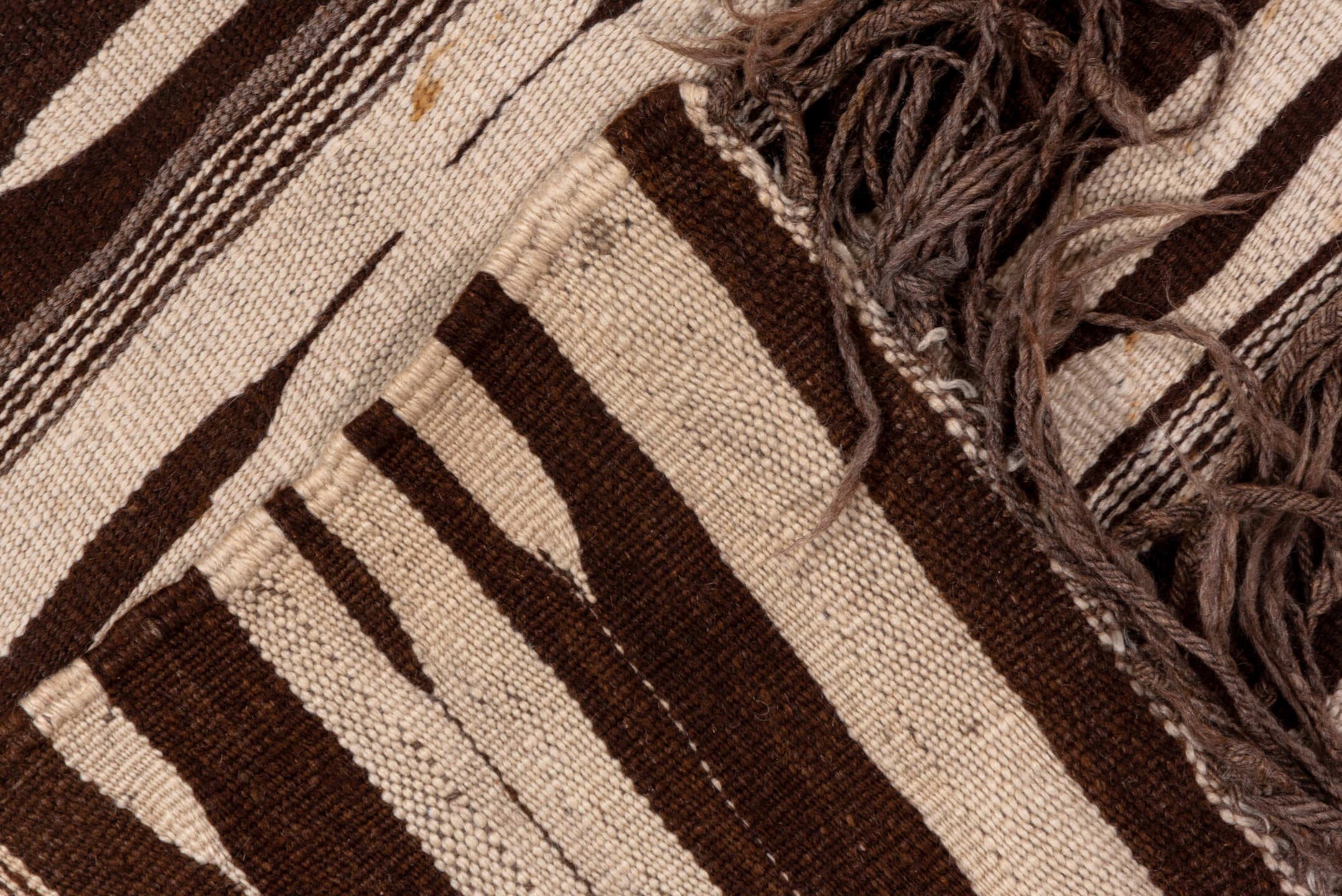 4' x 10' one-of-a-kind handmade vintage Kilim runner rug. Color palette: brown, ivory, taupe, beige, gray