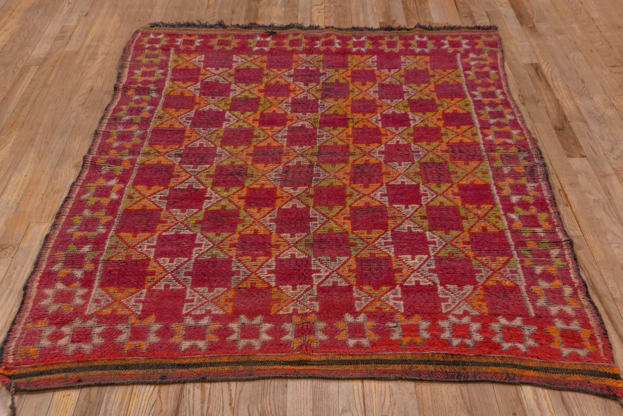 4' x 6' one-of-a-kind handmade vintage Moroccan small size rug. Color palette: rose, magenta, rust, ivory, saffron, brown