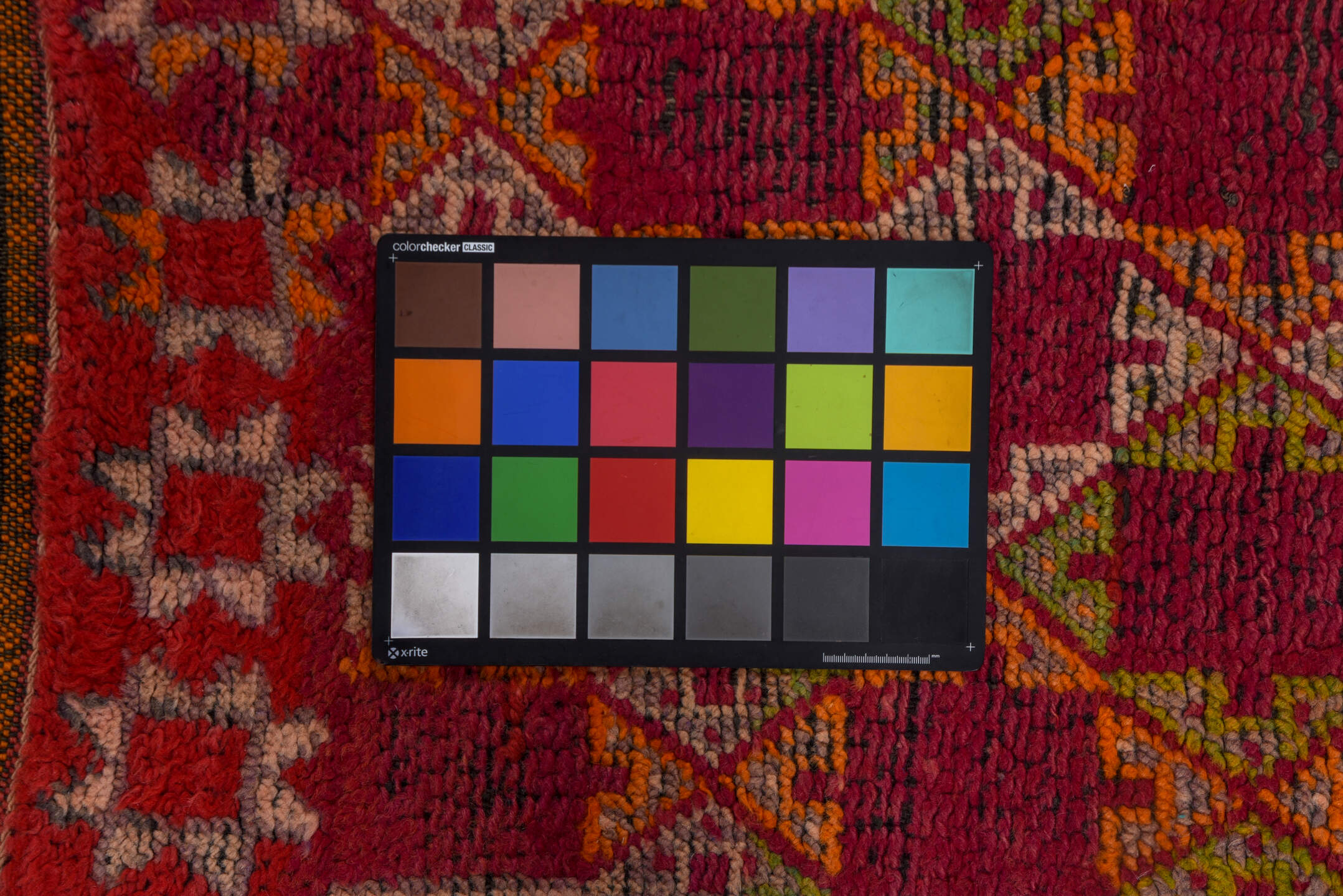 4' x 6' one-of-a-kind handmade vintage Moroccan small size rug. Color palette: rose, magenta, rust, ivory, saffron, brown