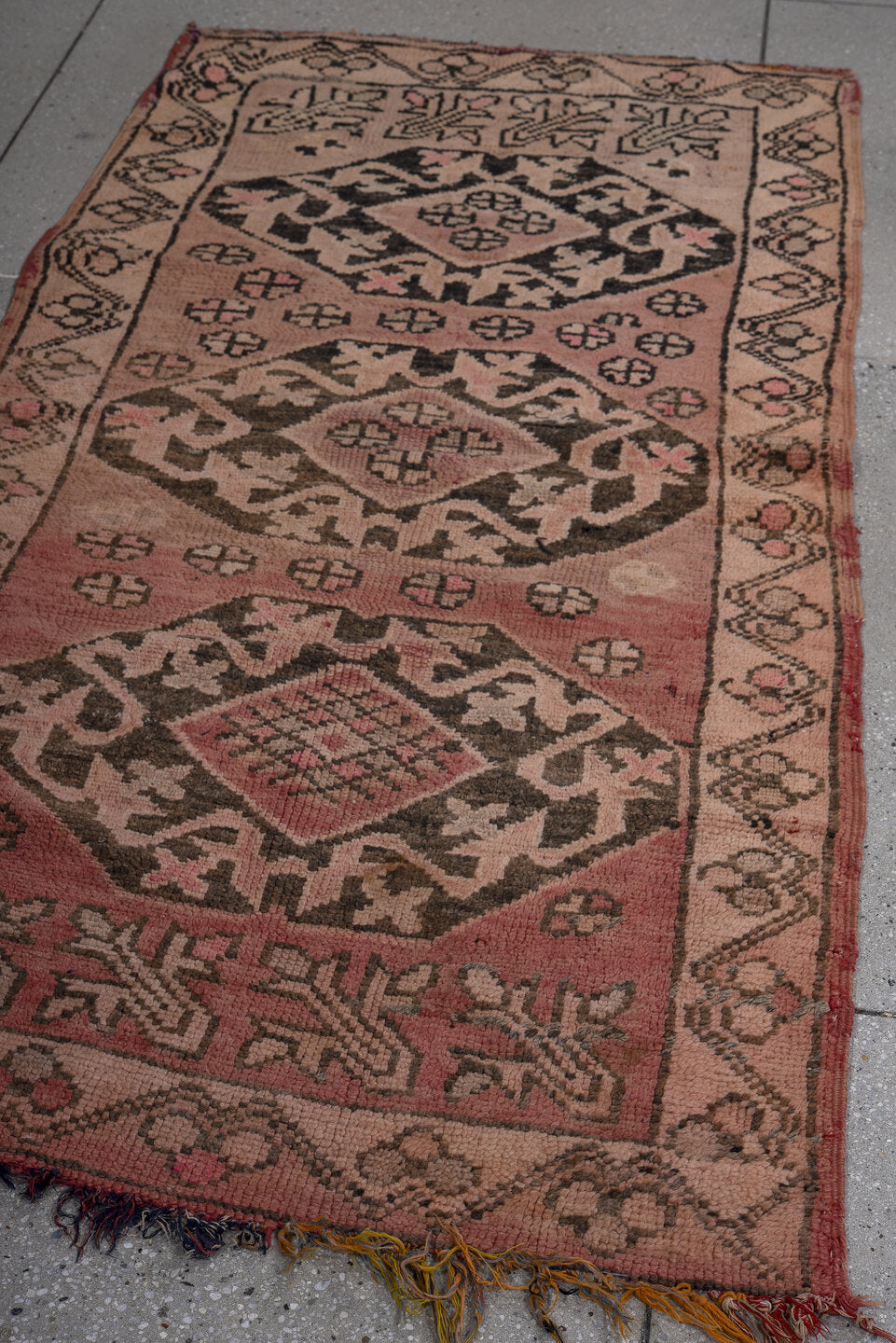 3' x 6' one-of-a-kind handmade vintage Moroccan runner rug. Color palette: gray, brown, red, pink, light blue, black