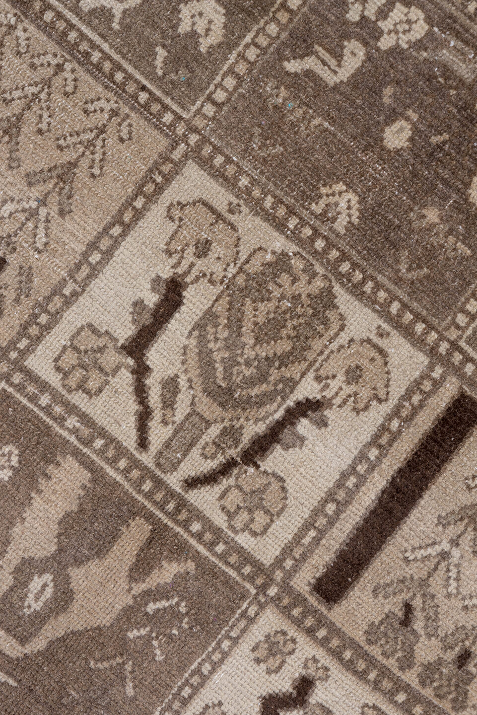 5' x 9' one-of-a-kind handmade antique Baktiary medium size rug. Color palette: taupe, brown, ivory, charcoal, camel, beige