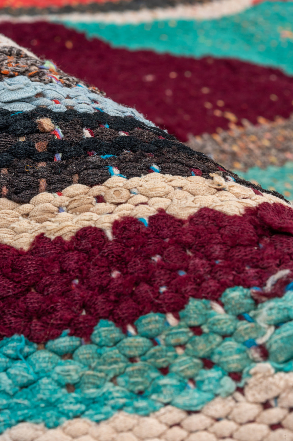 4' x 5' one-of-a-kind handmade vintage Rag Rug small size rug. Color palette: ivory, turquoise, charcoal, coral, burgundy