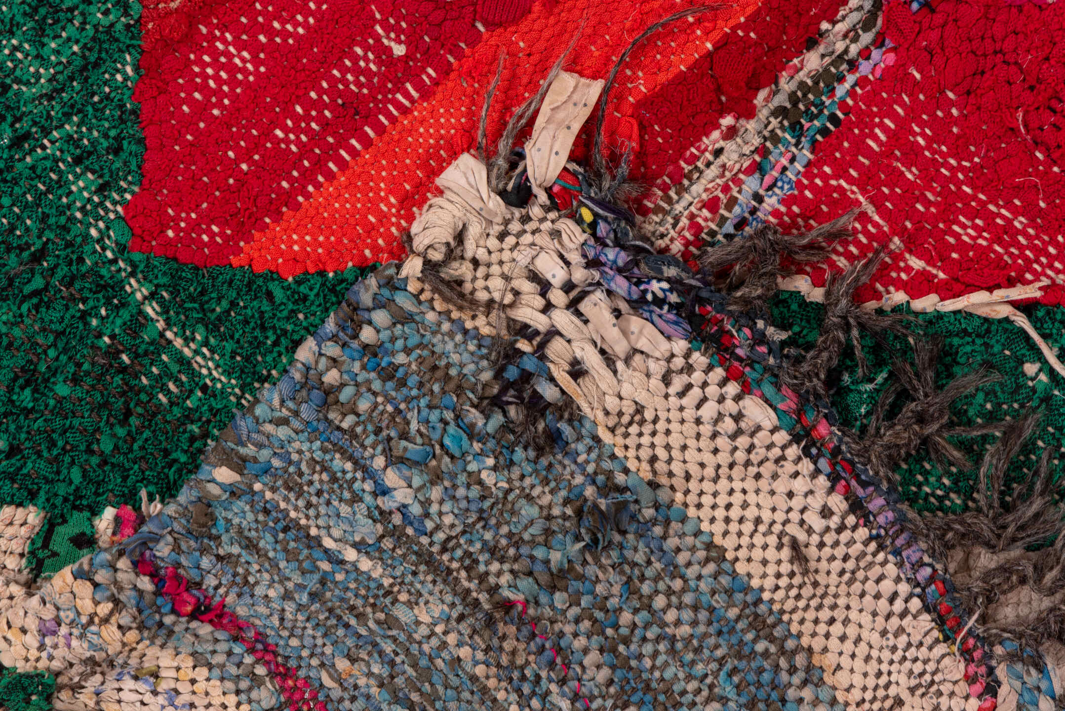 4' x 6' one-of-a-kind handmade vintage Rag Rug small size rug. Color palette: ivory, blue, charcoal, sky_blue, green, red