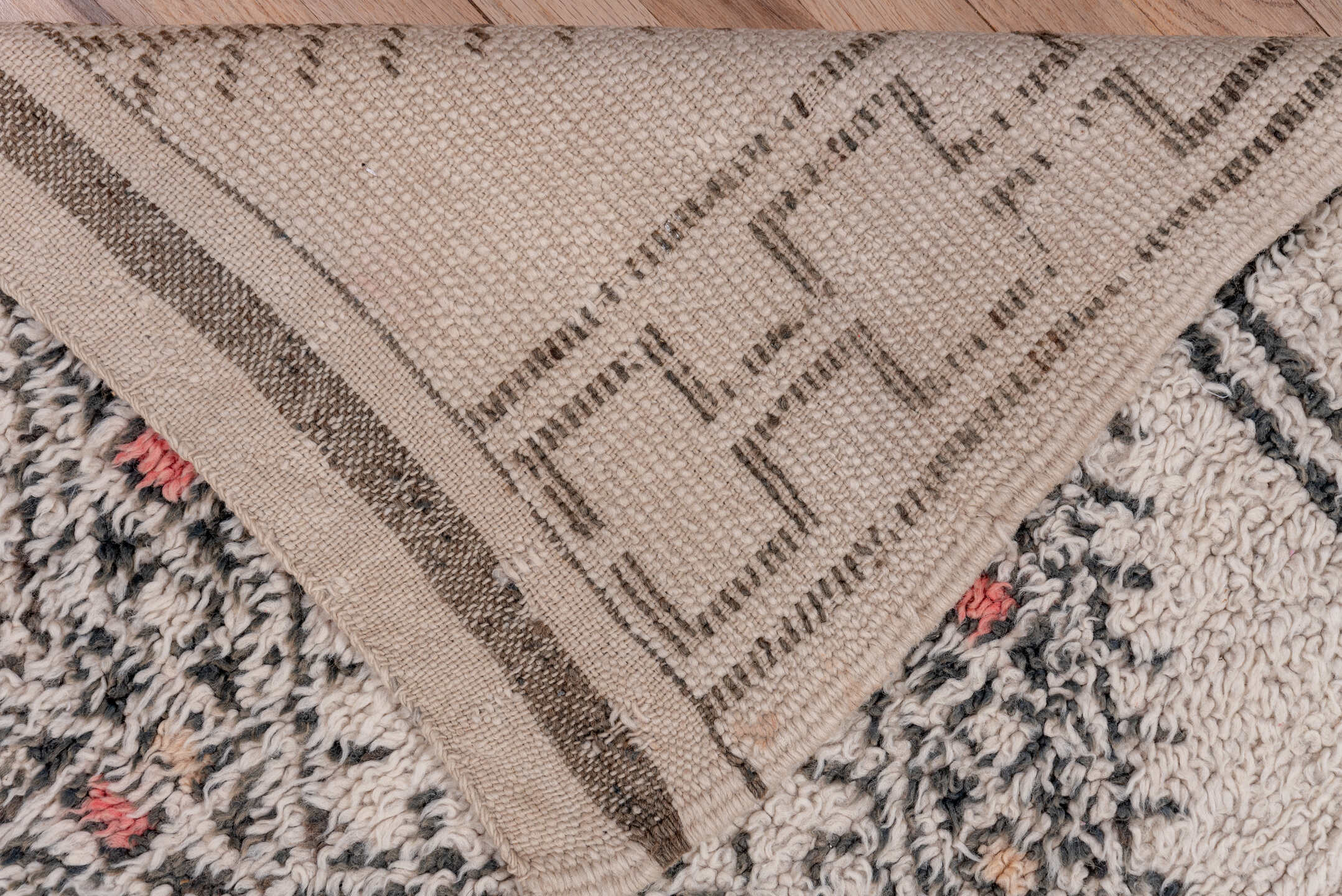 6' x 10' one-of-a-kind handmade vintage Moroccan large size rug. Color palette: antiquewhite, black, brown, charcoal