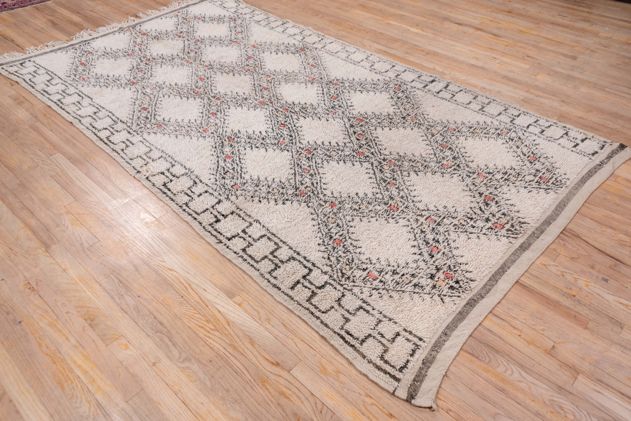 6' x 10' one-of-a-kind handmade vintage Moroccan large size rug. Color palette: antiquewhite, black, brown, charcoal