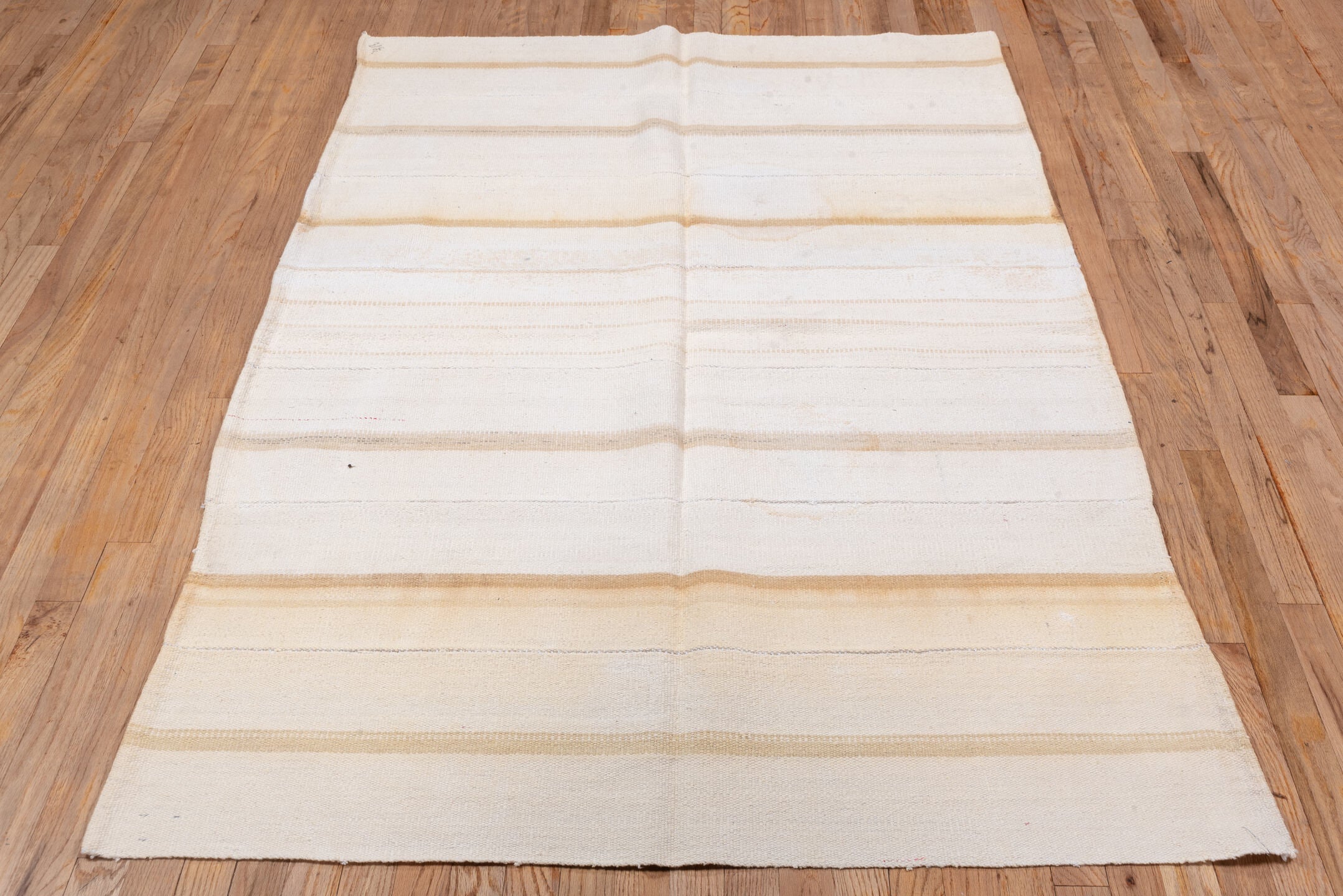 4' x 6' one-of-a-kind handmade vintage Flatweave small size rug. Color palette: ivory, cream, beige, camel