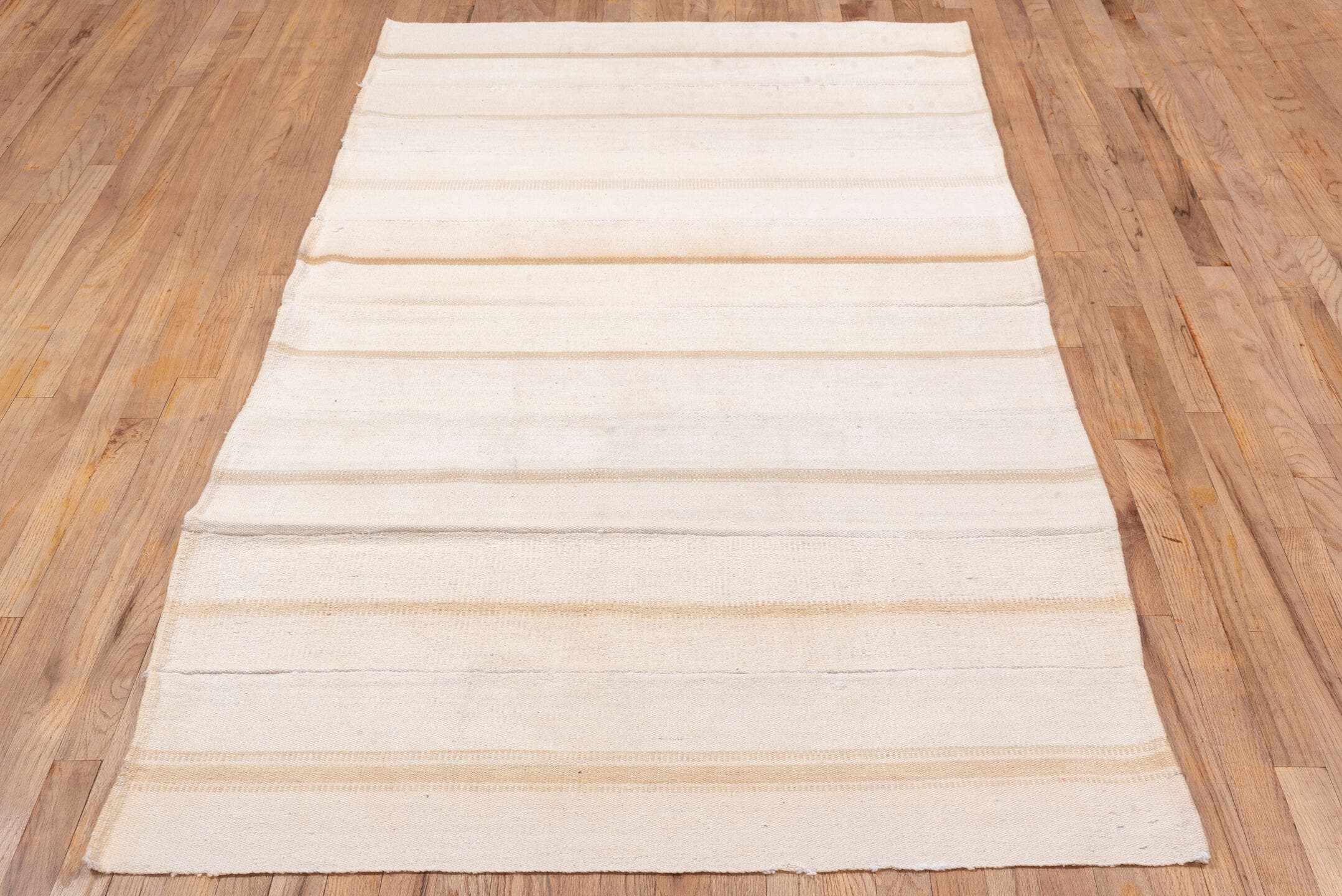 4' x 7' one-of-a-kind handmade vintage Flatweave rug. Color palette: ivory, cream, beige, taupe, gray
