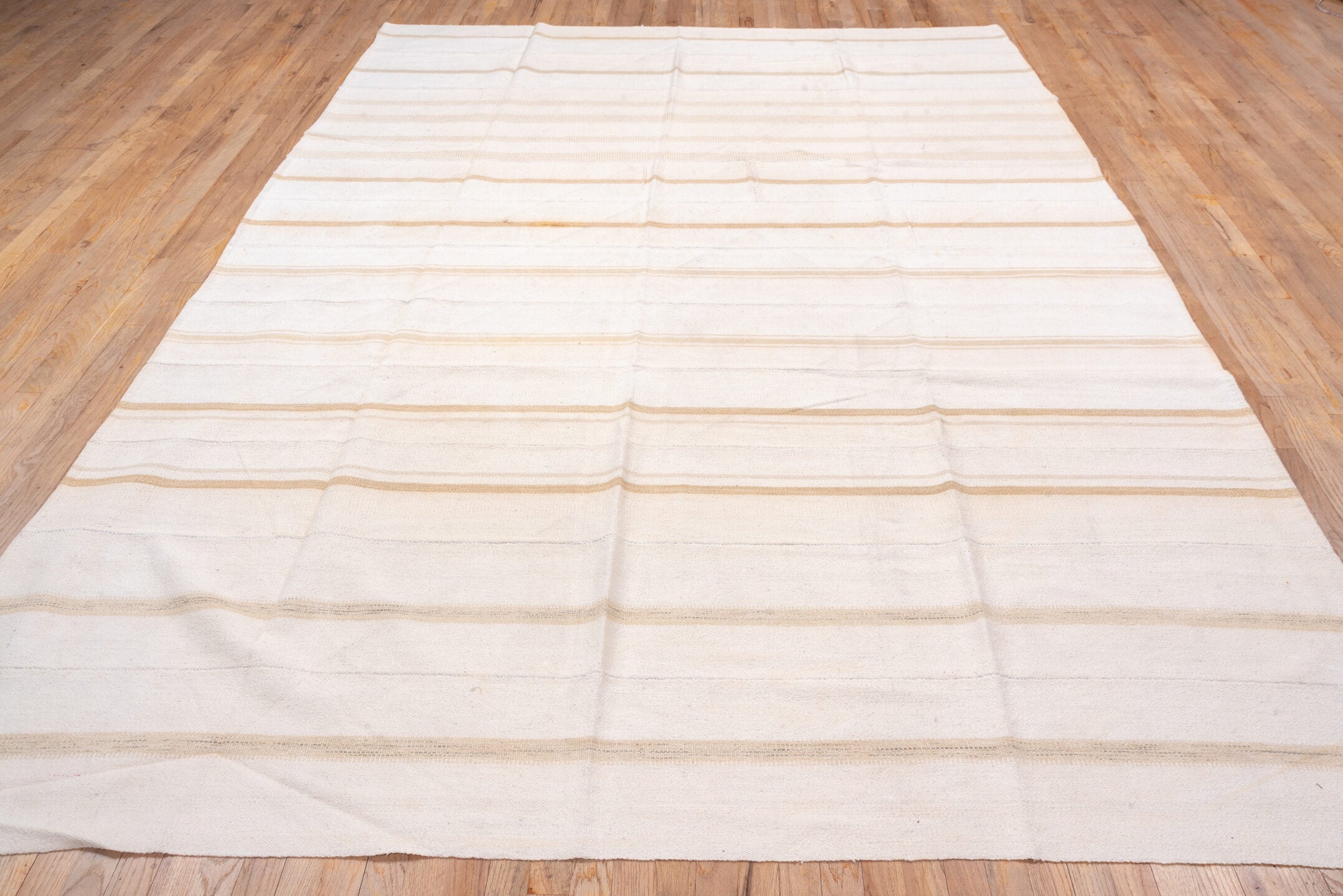 7' x 11' one-of-a-kind handmade vintage Flatweave large size rug. Color palette: ivory, beige, camel, cream