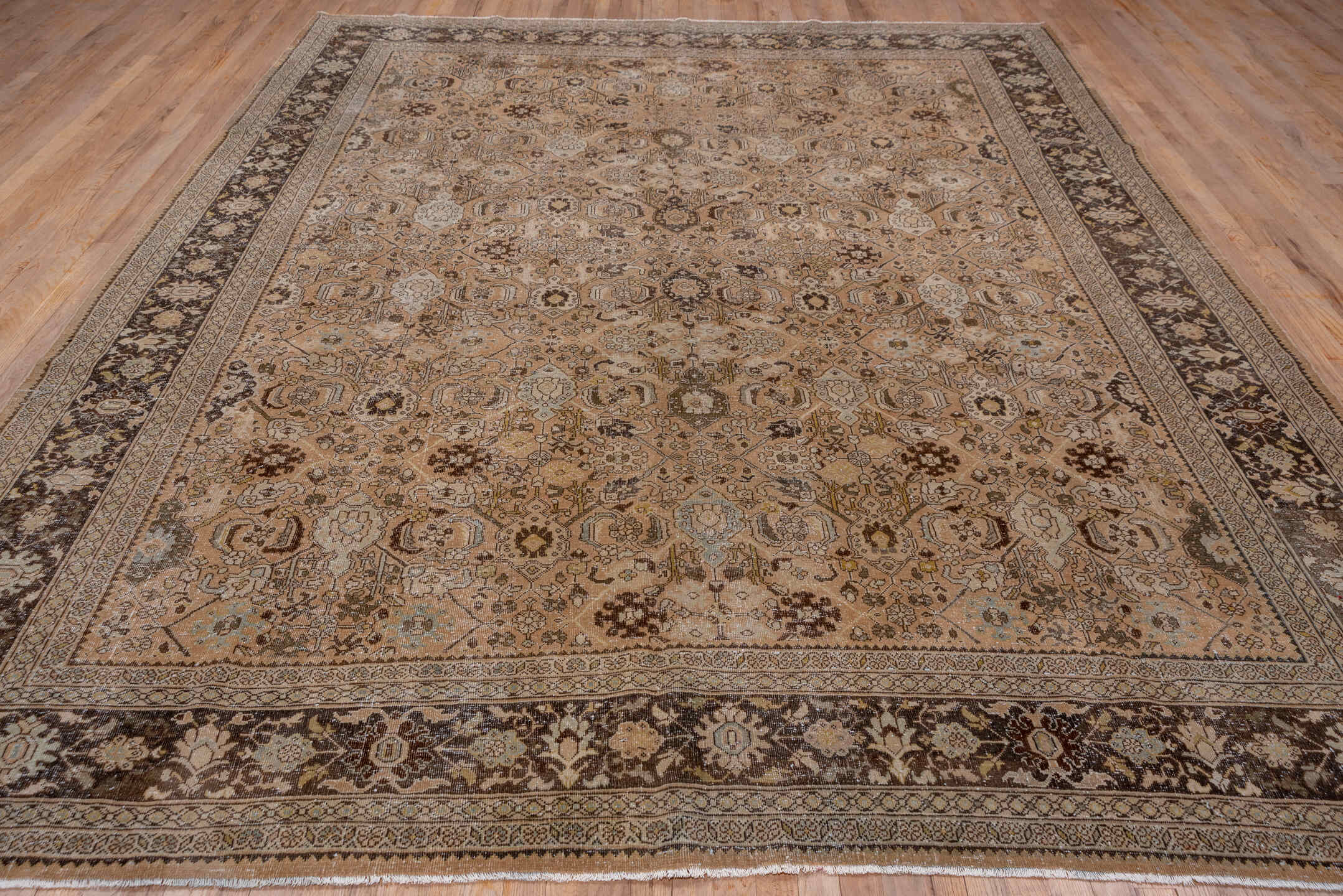9' x 12' one-of-a-kind handmade antique Mahal large size rug. Color palette: camel, brown, ivory, taupe, beige, charcoal