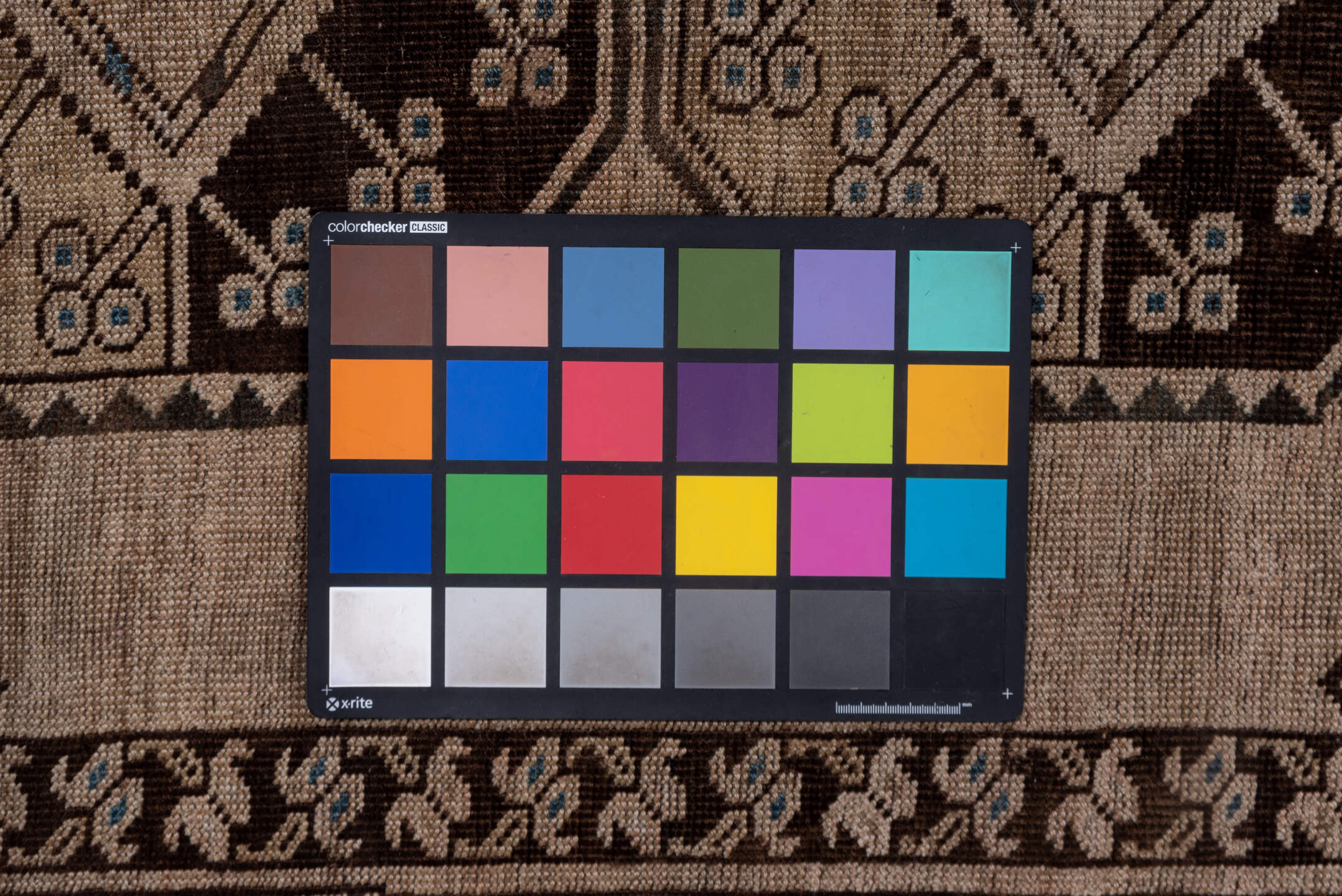 7' x 15' one-of-a-kind handmade vintage Afghan rug. Color palette: black, brown, gray, light gray, pink