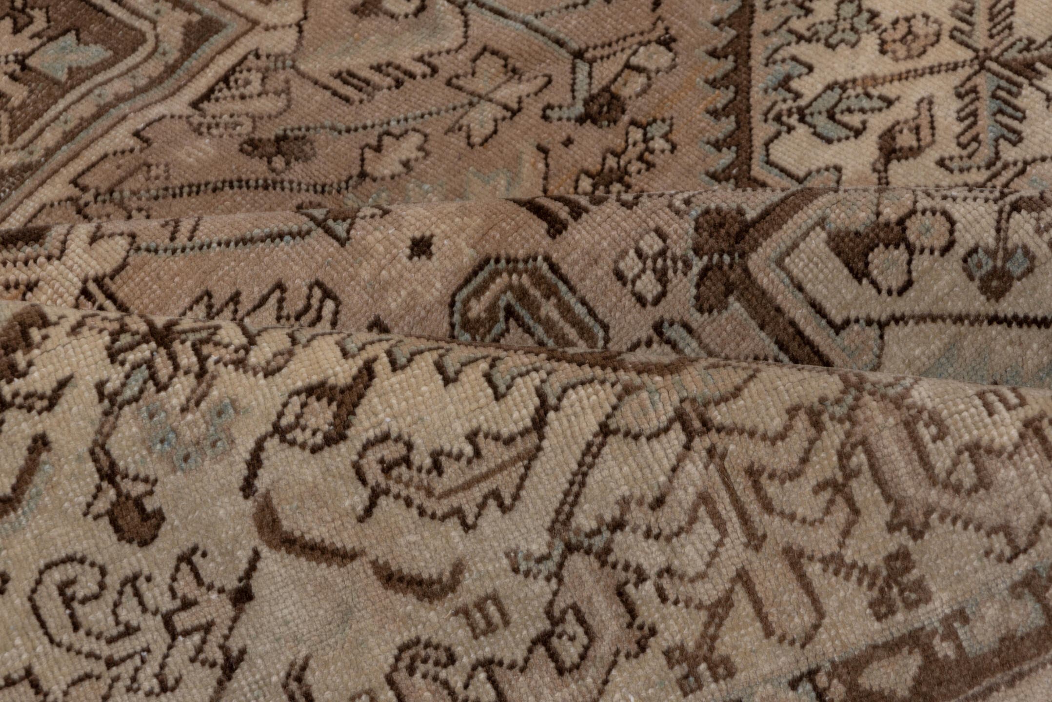 8' x 10' one-of-a-kind handmade antique Heriz large size rug. Color palette: taupe, brown, ivory, pale blue, camel, charcoal