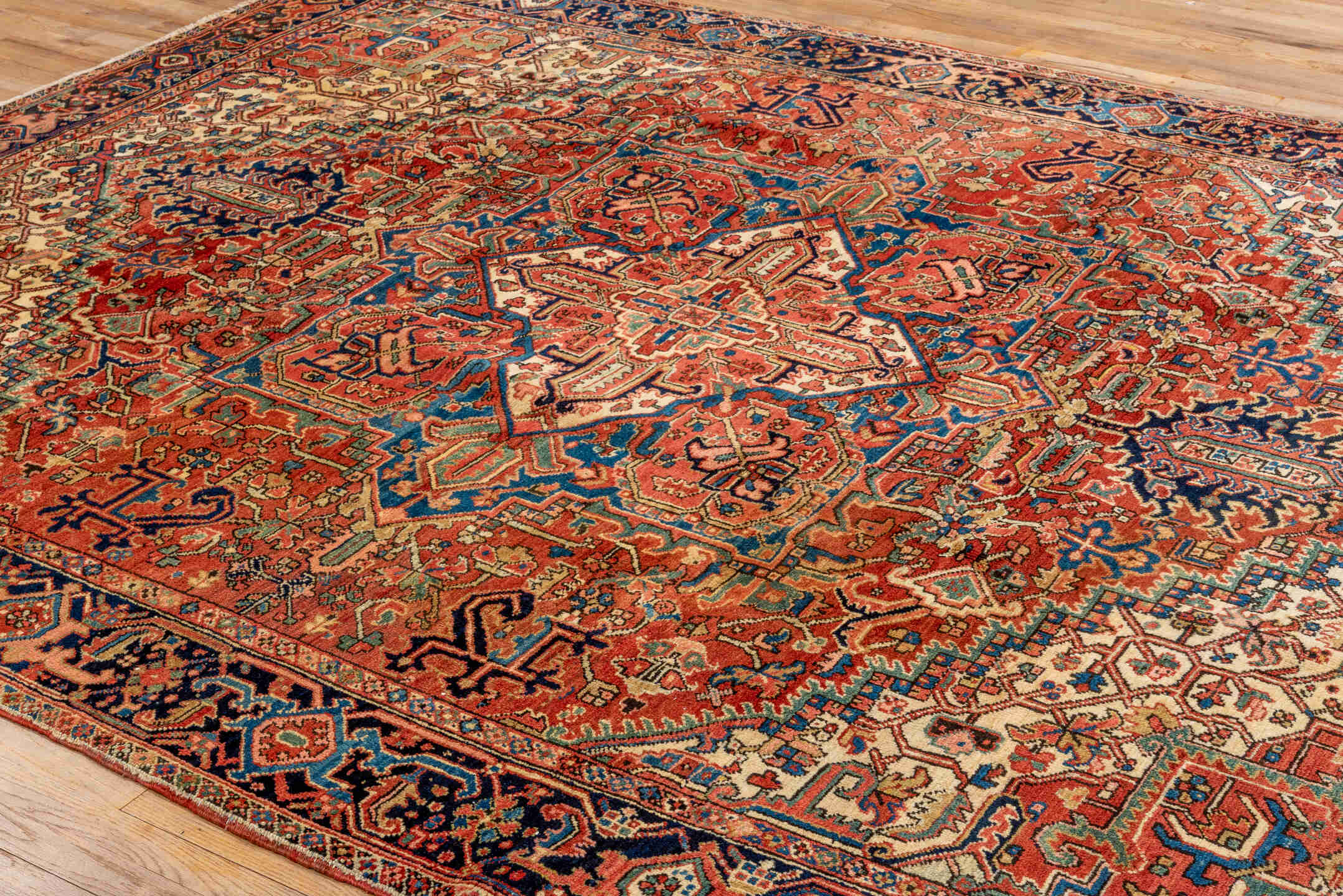 8' x 10' one-of-a-kind handmade vintage Heriz large size rug. Color palette: blue, brown, gray, off-white, orange, pink, red