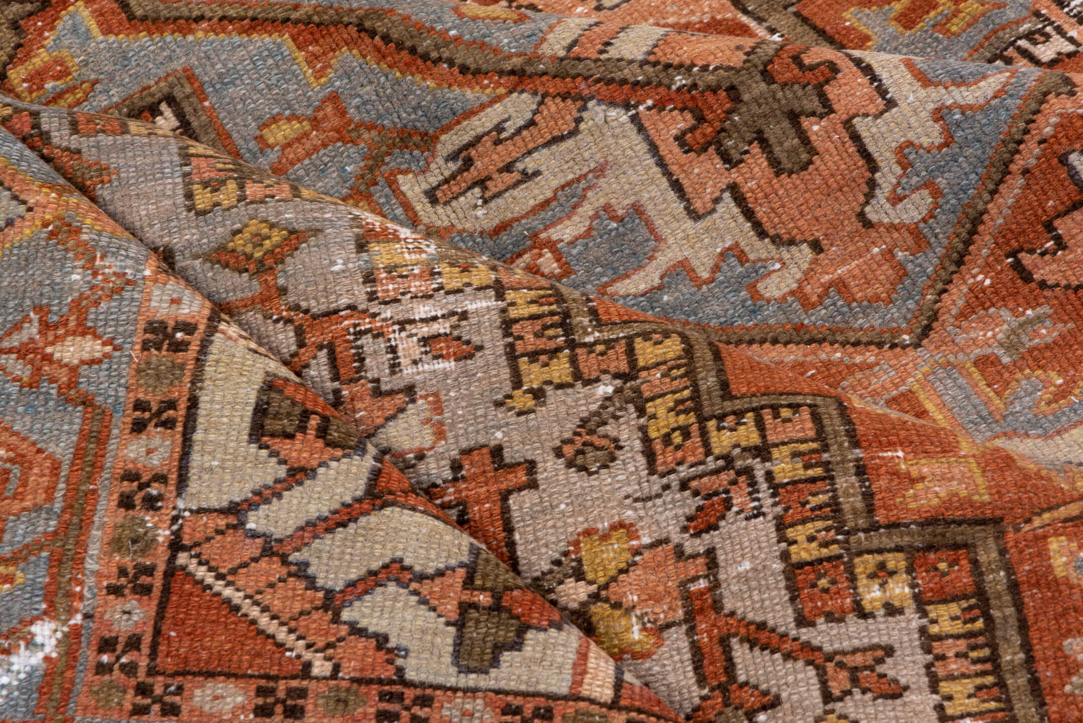 8' x 10' one-of-a-kind handmade antique Serapi large size rug. Color palette: terra cotta, light blue, ivory, rust, taupe