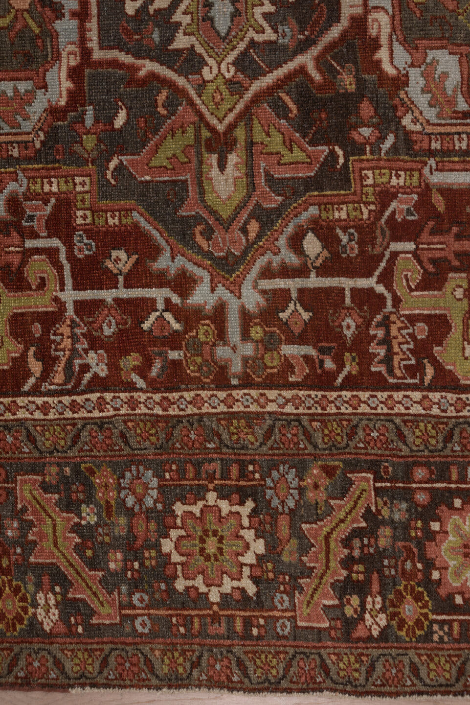 8' x 11' one-of-a-kind handmade antique Heriz large size rug. Color palette: rust, ivory, charcoal, terra cotta, olive