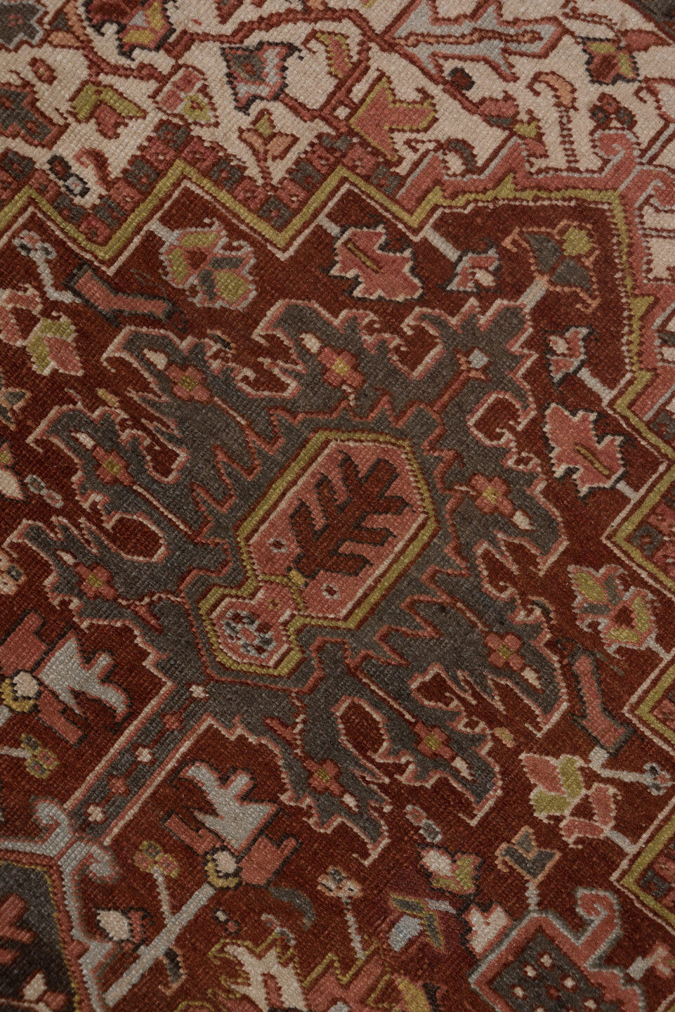 8' x 11' one-of-a-kind handmade antique Heriz large size rug. Color palette: rust, ivory, charcoal, terra cotta, olive