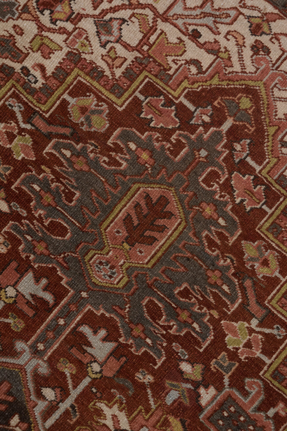 8' x 11' one-of-a-kind handmade antique Heriz large size rug. Color palette: rust, ivory, charcoal, terra cotta, olive