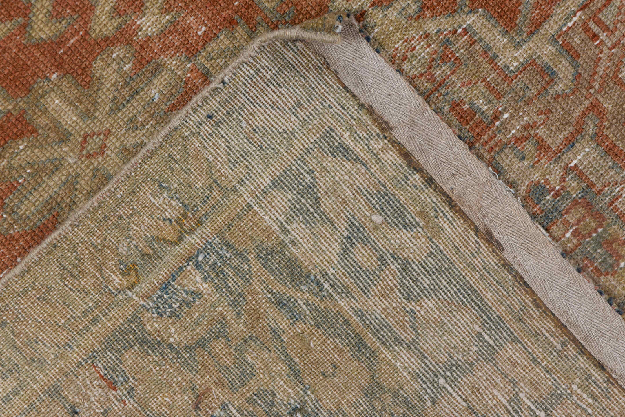 7' x 10' one-of-a-kind handmade antique Karaje large size rug. Color palette: terra cotta, taupe, beige, ivory, slate, camel