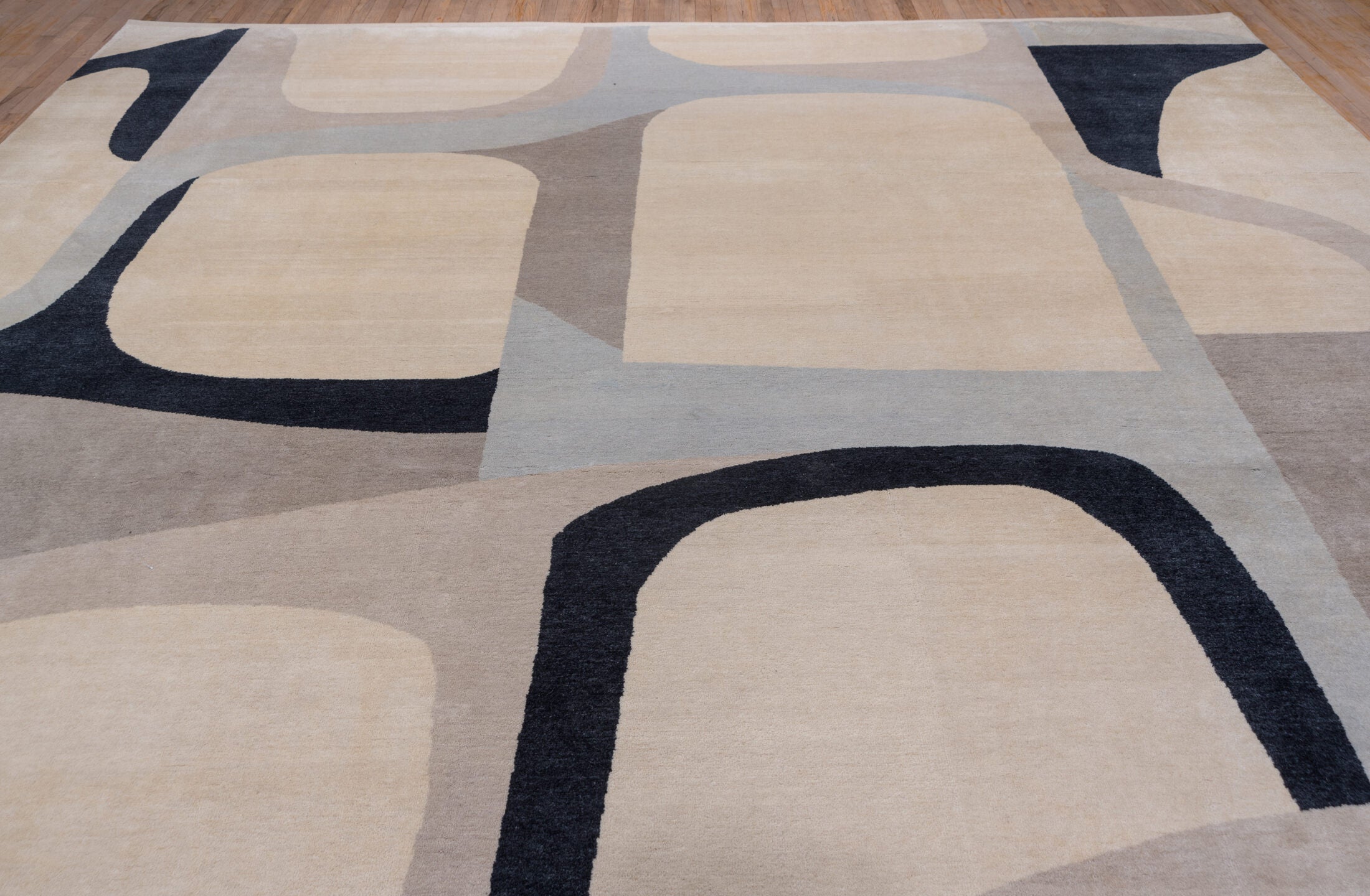 12' x 13' one-of-a-kind handmade vintage Art Deco oversize rug. Color palette: black, blue, brown, dark gray, gray