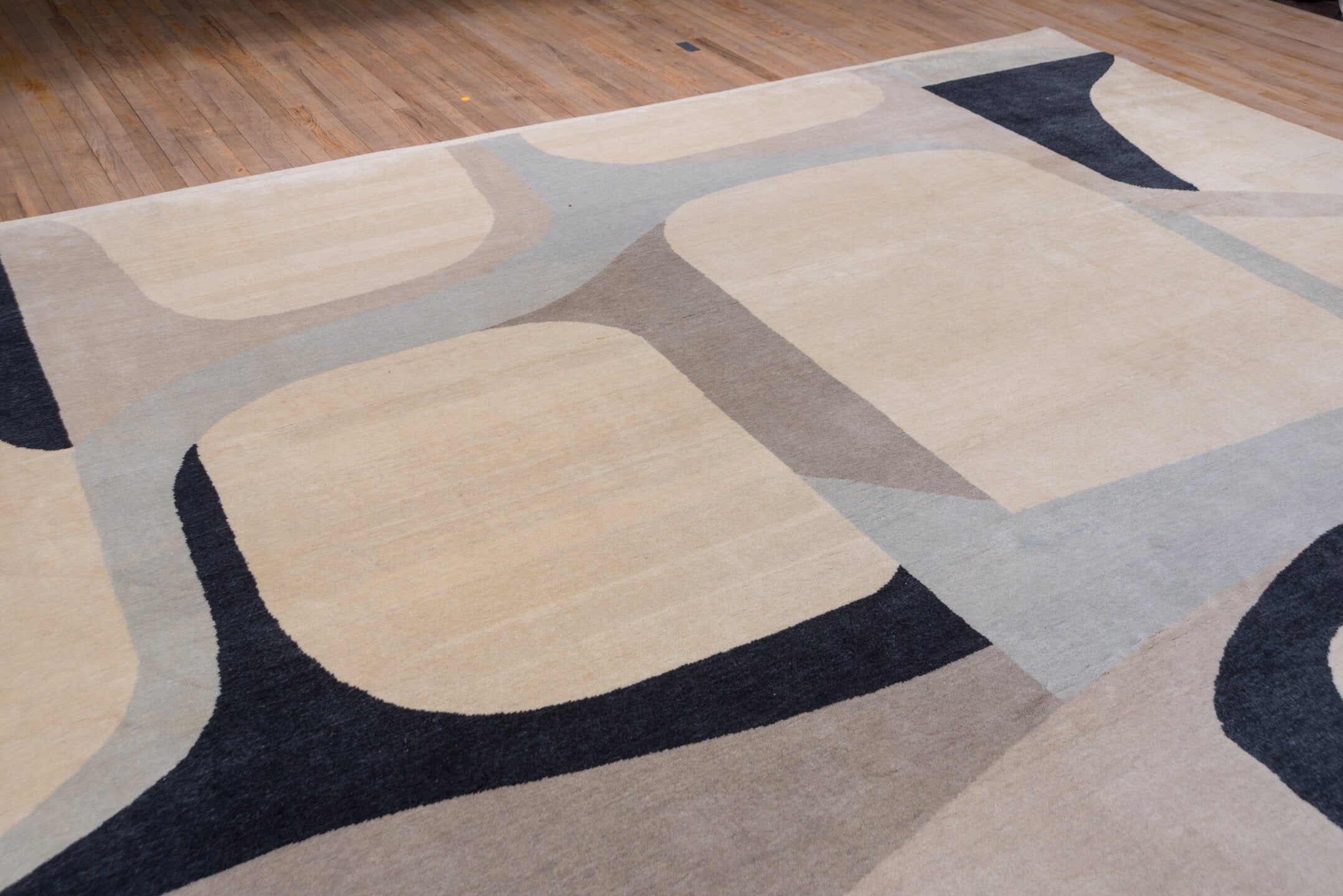 12' x 13' one-of-a-kind handmade vintage Art Deco oversize rug. Color palette: black, blue, brown, dark gray, gray