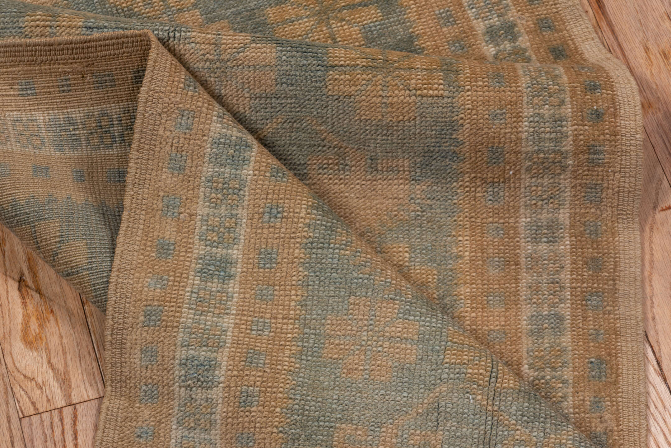 1' x 9' one-of-a-kind handmade antique Oushak rug. Color palette: camel, taupe, slate, ivory, sage, beige, gray, green