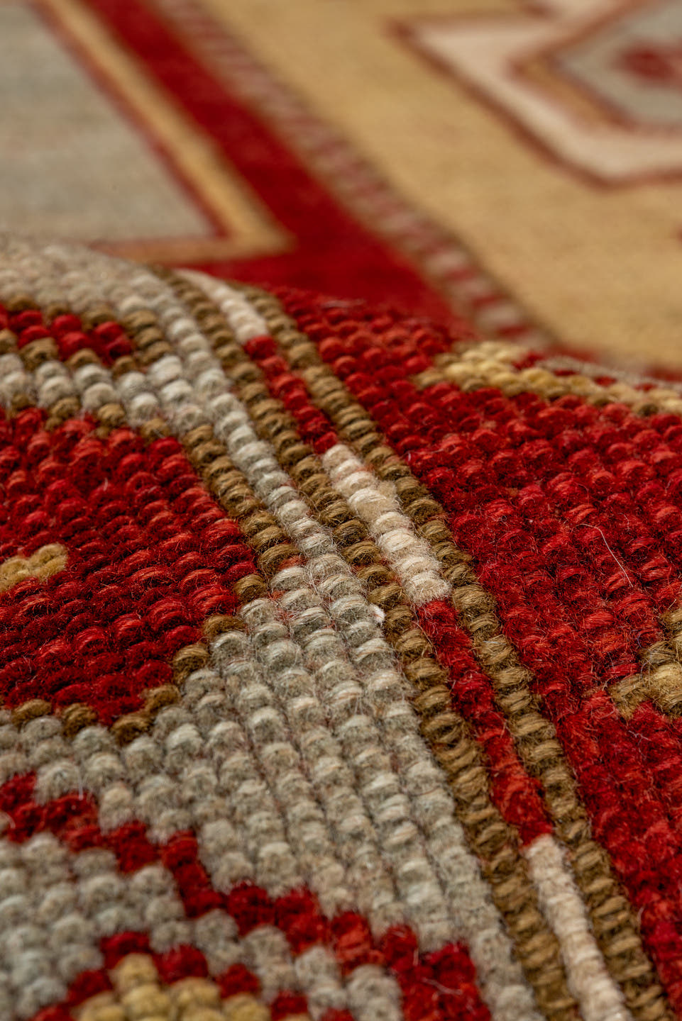 4' x 6' one-of-a-kind handmade antique Caucasian rug. Color palette: ivory, rust, crimson, camel, gold, taupe, terracotta