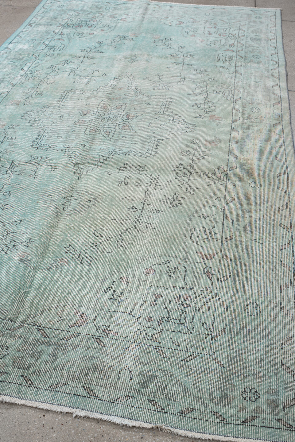 5' x 9' one-of-a-kind handmade vintage Sparta medium size rug. Color palette: ivory, pale blue, sky blue, taupe, soft gray