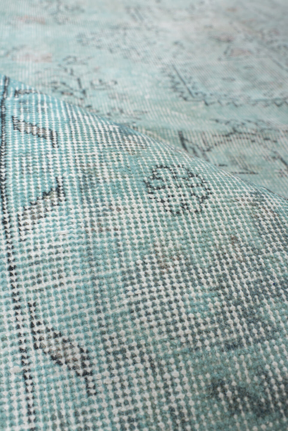 5' x 9' one-of-a-kind handmade vintage Sparta medium size rug. Color palette: ivory, pale blue, sky blue, taupe, soft gray