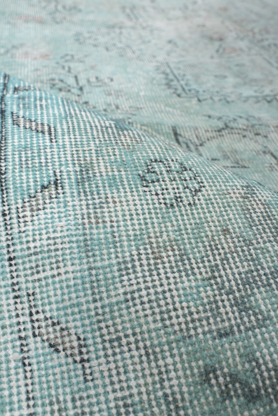 5' x 9' one-of-a-kind handmade vintage Sparta medium size rug. Color palette: ivory, pale blue, sky blue, taupe, soft gray