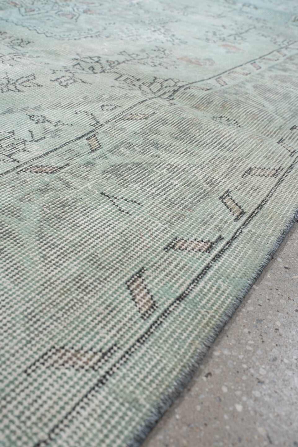 5' x 9' one-of-a-kind handmade vintage Sparta medium size rug. Color palette: ivory, pale blue, sky blue, taupe, soft gray