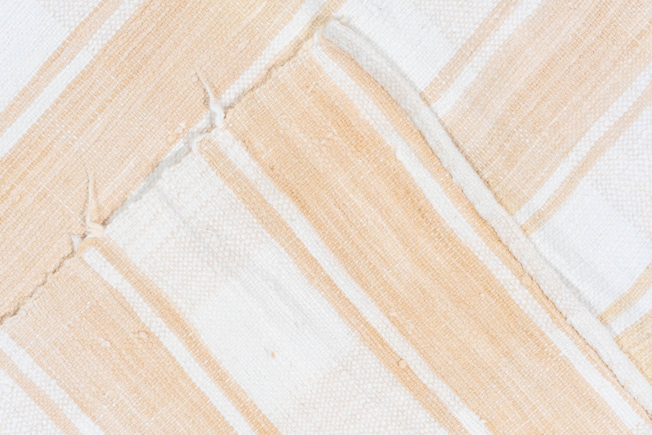 5' x 8' one-of-a-kind handmade antique Textile medium size rug. Color palette: ivory, cream, camel, sand, beige