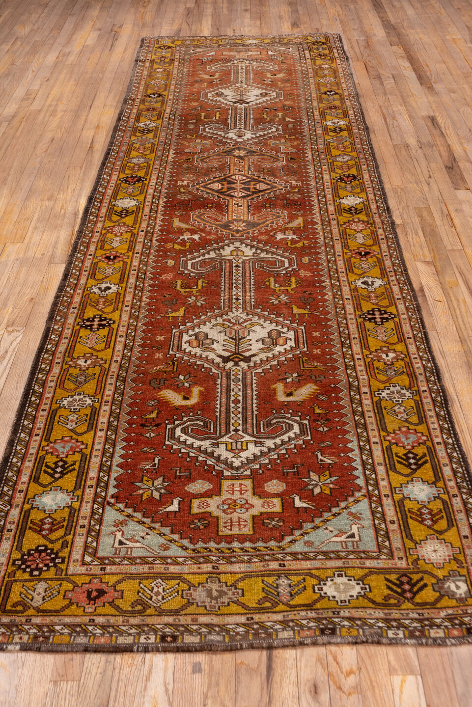 3' x 12' one-of-a-kind handmade vintage NW Persian runner rug. Color palette: brown, gray, pink, yellow