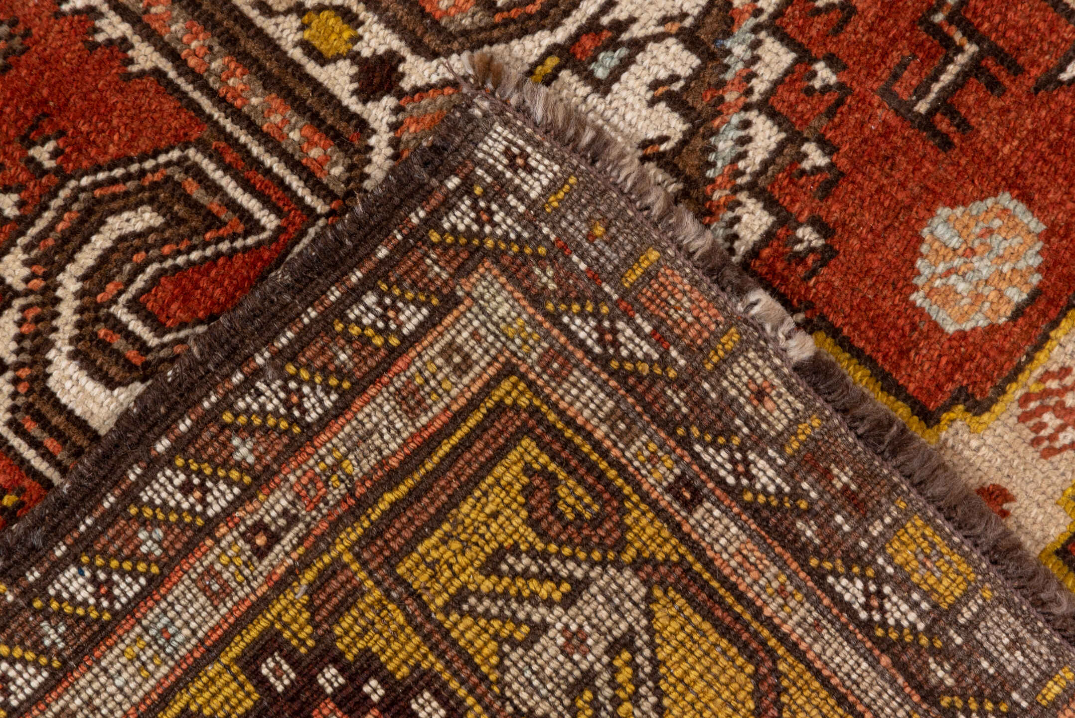 3' x 12' one-of-a-kind handmade vintage NW Persian runner rug. Color palette: brown, gray, pink, yellow