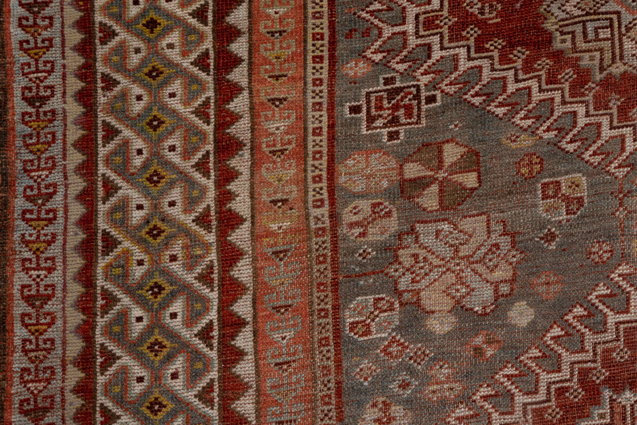 6' x 12' one-of-a-kind handmade antique Shiraz large size rug. Color palette: rust, blue_gray, ivory, taupe, terra_cotta