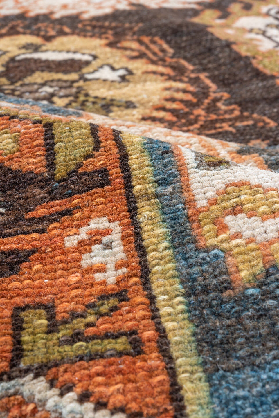 4' x 6' one-of-a-kind handmade antique Baktiary rug. Color palette: sky blue, rust, ivory, brown, camel, slate, taupe, olive