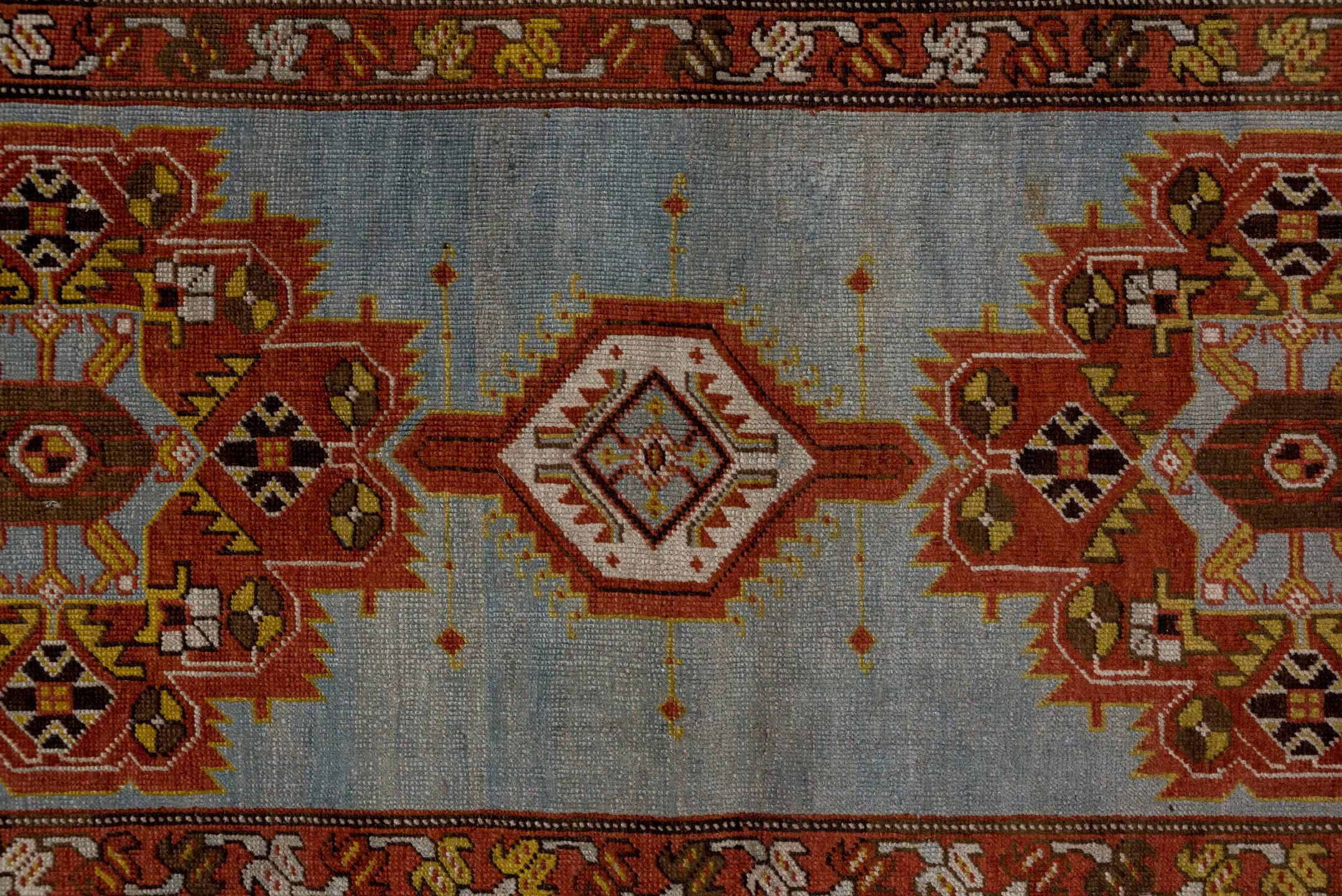 3' x 14' one-of-a-kind handmade antique Heriz runner rug. Color palette: rust, light blue, ivory, gold, brown, charcoal