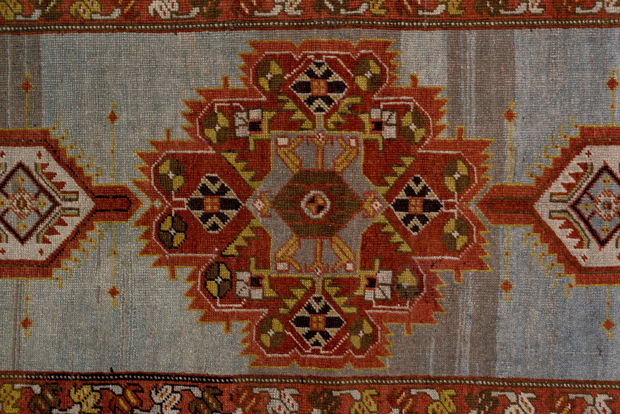 3' x 14' one-of-a-kind handmade antique Heriz runner rug. Color palette: rust, light blue, ivory, gold, brown, charcoal