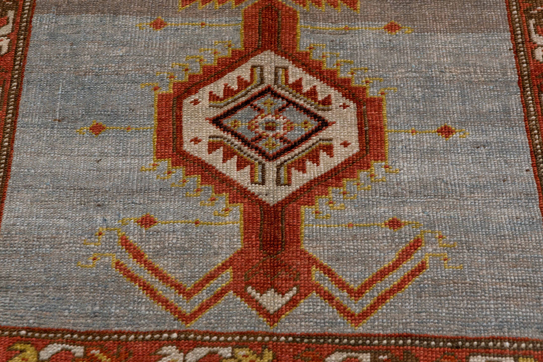 3' x 14' one-of-a-kind handmade antique Heriz runner rug. Color palette: rust, light blue, ivory, gold, brown, charcoal