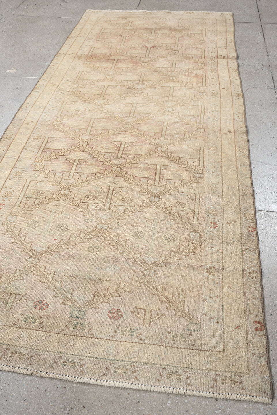 3' x 9' one-of-a-kind handmade antique Anatolian runner rug. Color palette: ivory, blush, taupe, sage, terracotta, camel