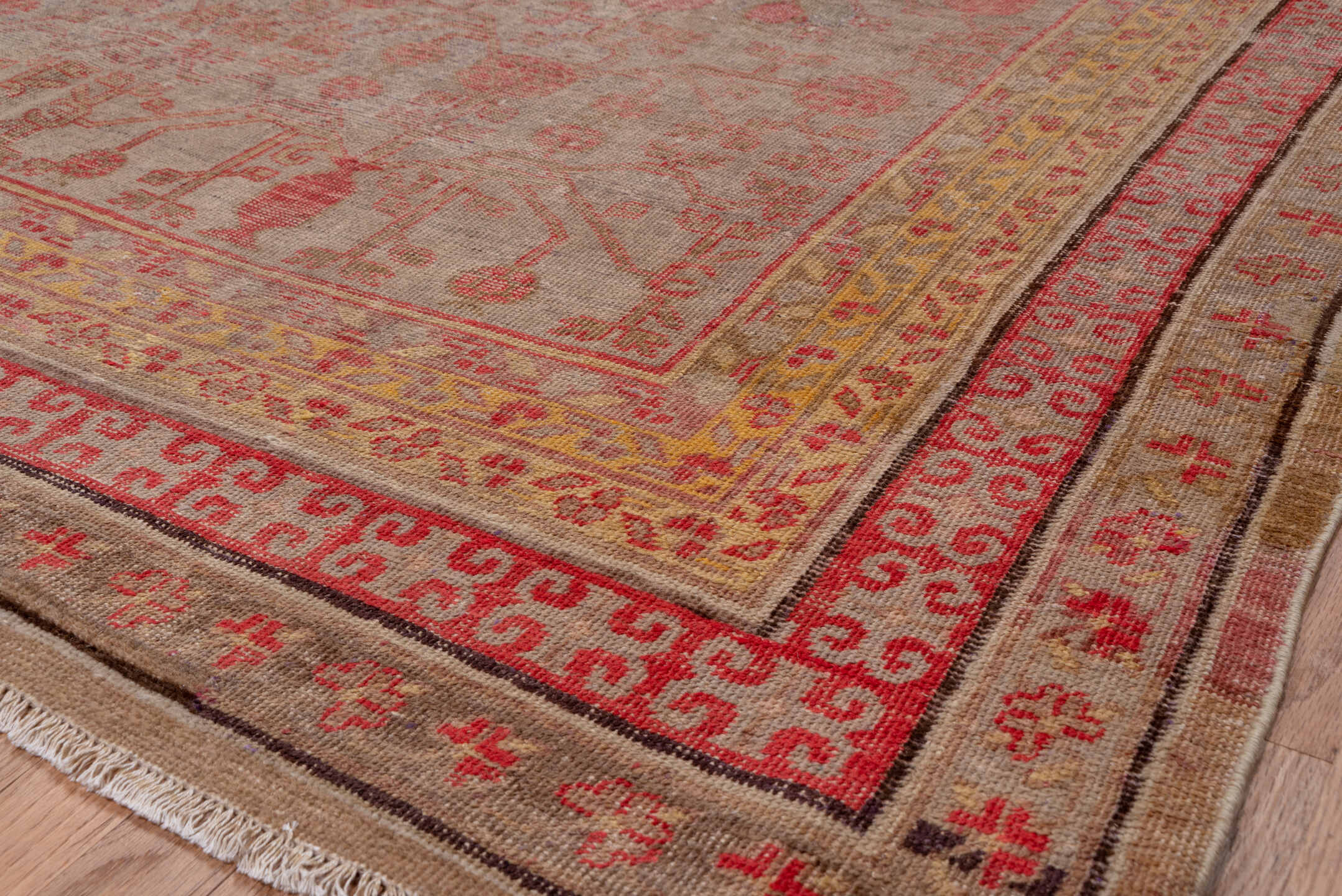 6' x 13' one-of-a-kind handmade antique Khotan large size rug. Color palette: taupe, rose, coral, camel, ivory, sienna