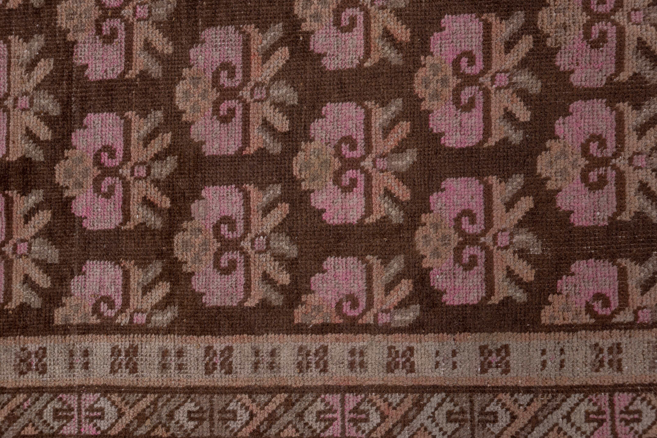 4' x 9' one-of-a-kind handmade vintage Khotan rug. Color palette: brown, rose, taupe, ivory, dusty pink, charcoal, camel